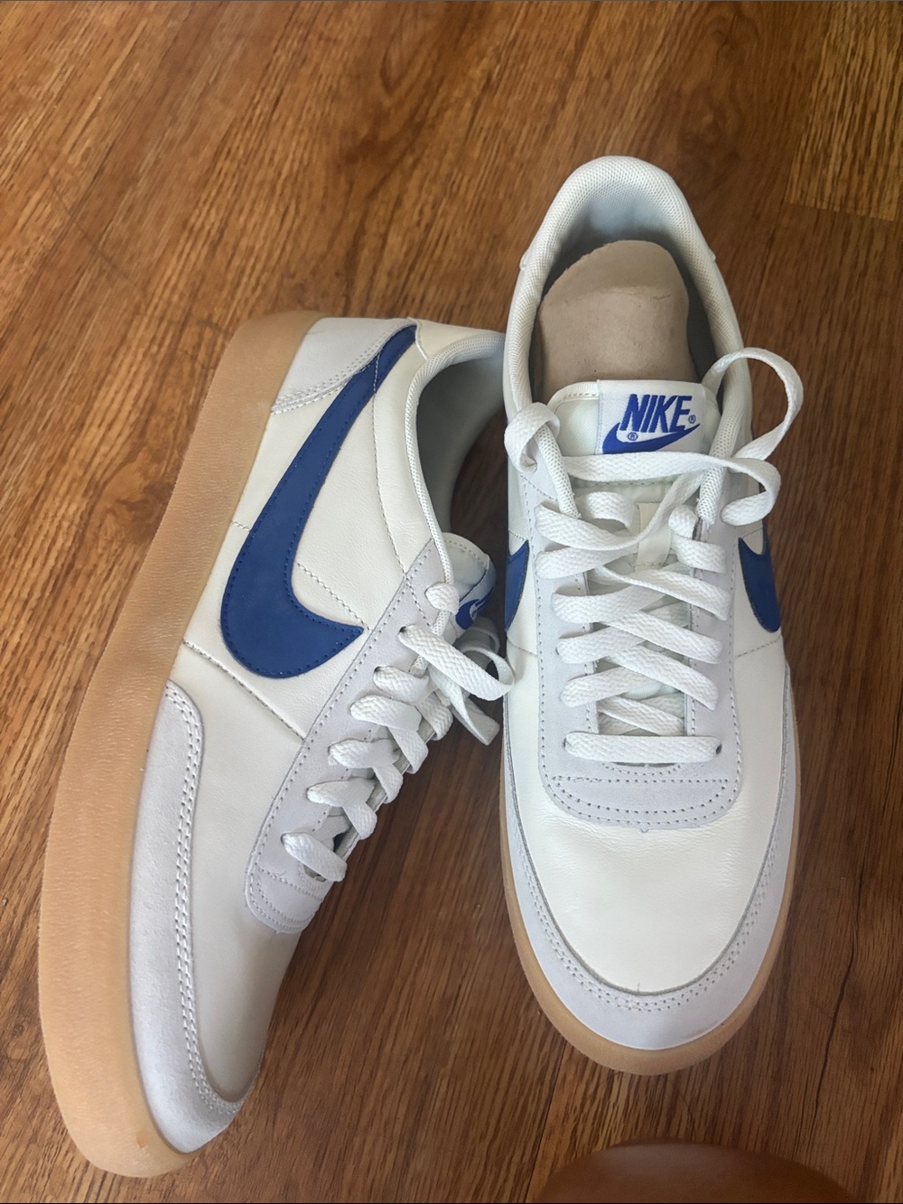 Nike White Sneakers with Blue Swoosh and Gum Sole